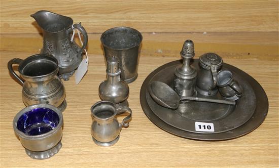 A collection of pewter mugs and twelve items of pewter, 18th and 19th century